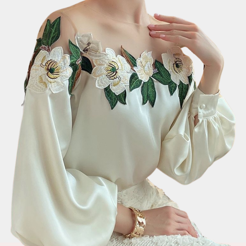 Elegante zomerse gebloemde damesblouse