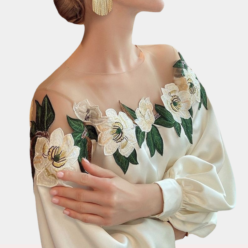 Elegante zomerse gebloemde damesblouse