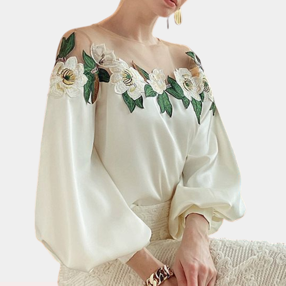 Elegante zomerse gebloemde damesblouse