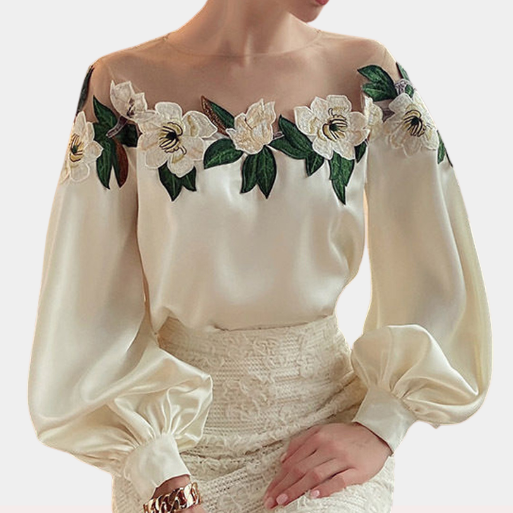 Elegante zomerse gebloemde damesblouse